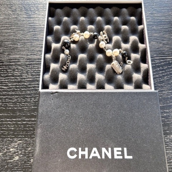 CHANEL RARE SHOE, HANDBAG & LOGO CHARM BRACELET - Picture 1 of 4